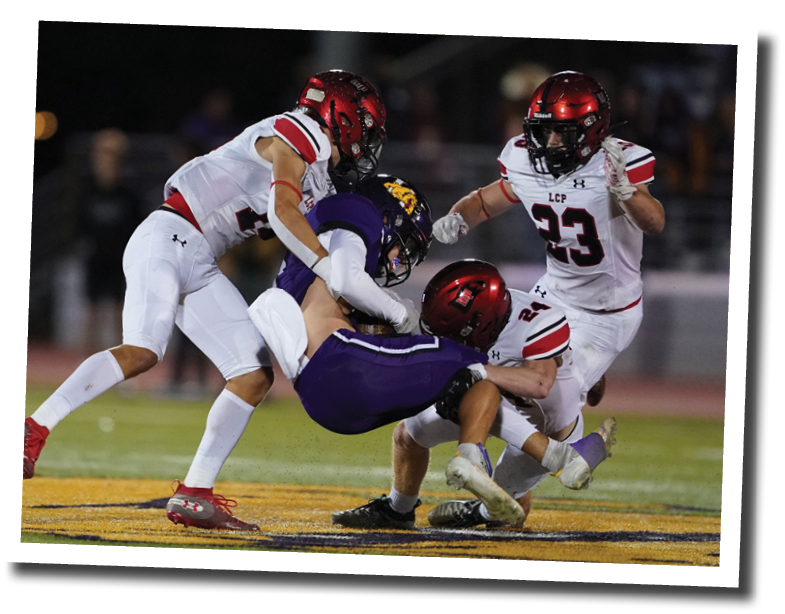 Several Pirate defenders surround a Wylie receiver  Lubbock-Cooper vs  Abilene Wylie  Photo by: Aaron Baxter