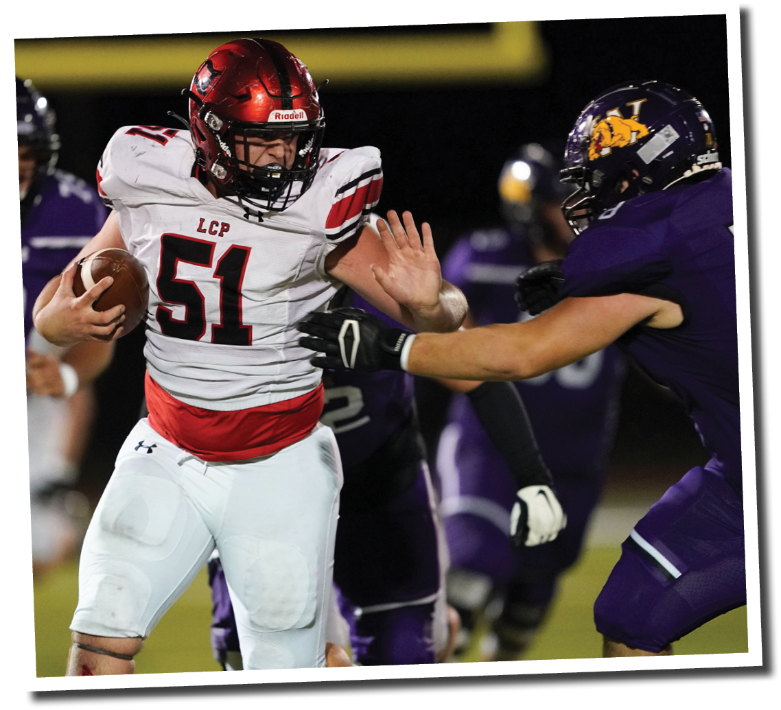 Ty Politte (51) snags an interception and turns up the sideline  Lubbock-Cooper vs  Abilene Wylie  Photo by: Aaron Baxter