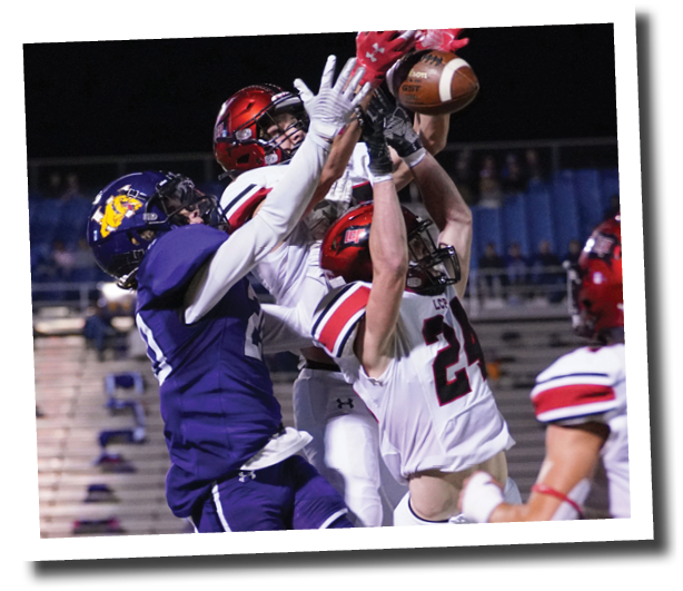 Callan Ritz and Carson Bradshaw deflect a deep pass  Lubbock-Cooper vs  Abilene Wylie  Photo by: Aaron Baxter