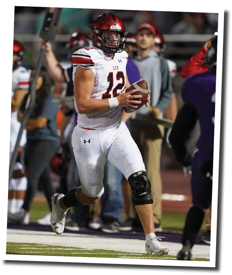 Pirate QB Holt Gibson takes the ball himself up the right side  Lubbock-Cooper vs  Abilene Wylie  Photo by: Aaron Baxter