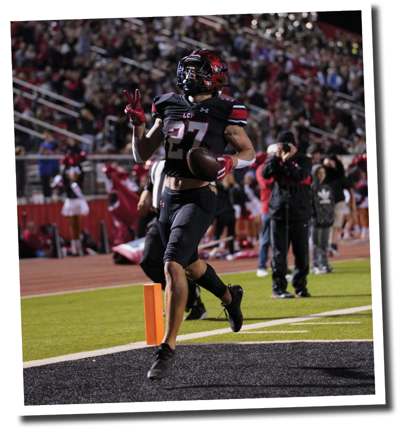 Callan Ritz (27) trots into the endzone on a long punt return  Lubbock-Cooper vs  Randall  Photo by: Aaron Baxter