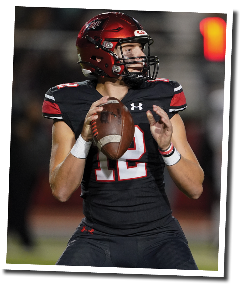 QB Holt Gibson (12) looks upfield for a pass  Lubbock-Cooper vs  Randall  Photo by: Aaron Baxter