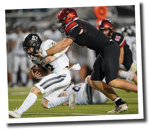Kyler Jordan (1) sacks Randall QB Braxton Burd  Lubbock-Cooper vs  Randall  Photo by: Aaron Baxter
