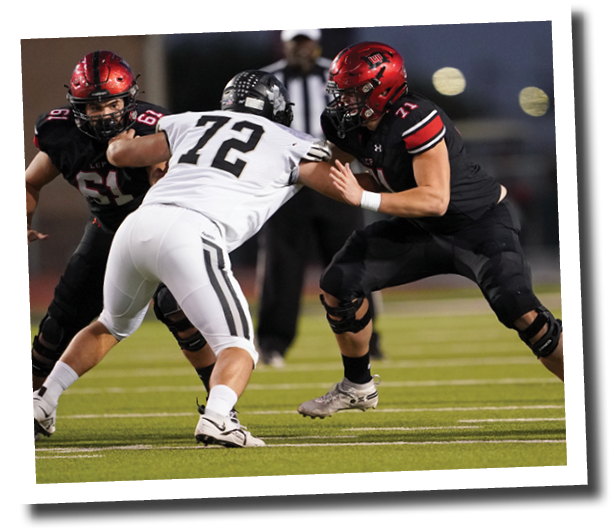 Keegan Wehrman (61) and Tanyon Zachary (71) block Randall defender Aiden Dreup  Lubbock-Cooper vs  Randall  Photo by: Aaron Baxter