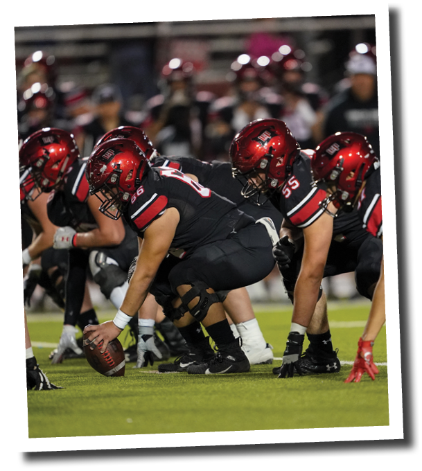 The Pirate offensive line prepares for the snap  Lubbock-Cooper vs  Randall  Photo by: Aaron Baxter