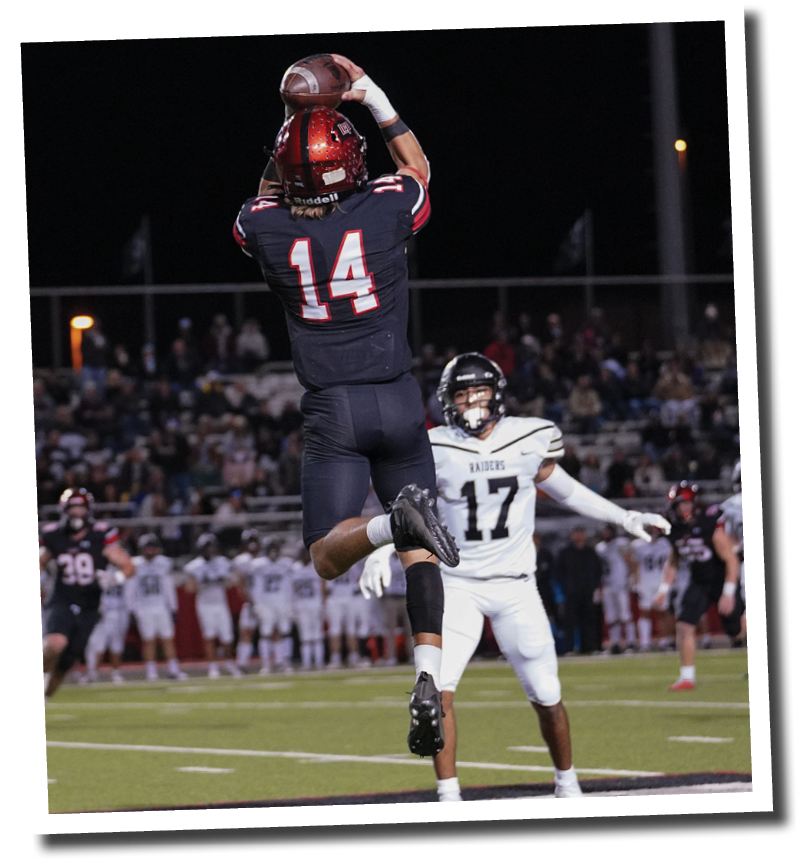 Koen Piepkorn (14) climbs the ladder to grab an interception  Lubbock-Cooper vs  Randall  Photo by: Aaron Baxter