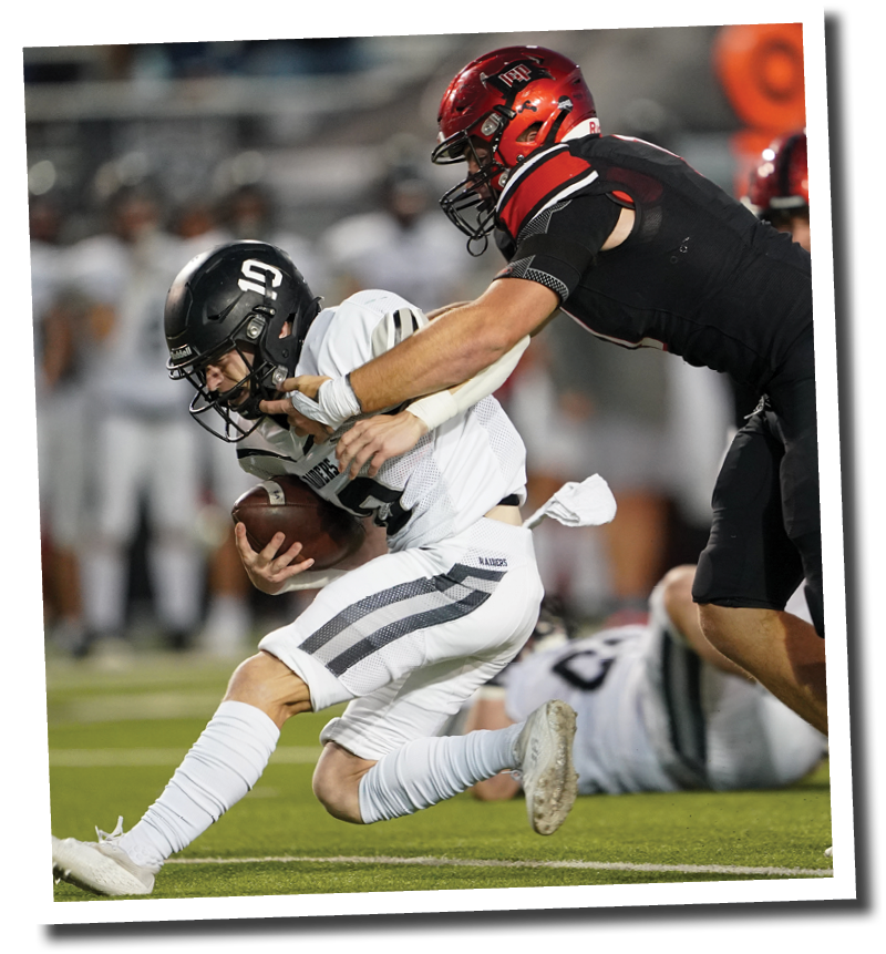 Kyler Jordan (1) sacks Randall QB Braxton Burd  Lubbock-Cooper vs  Randall  Photo by: Aaron Baxter