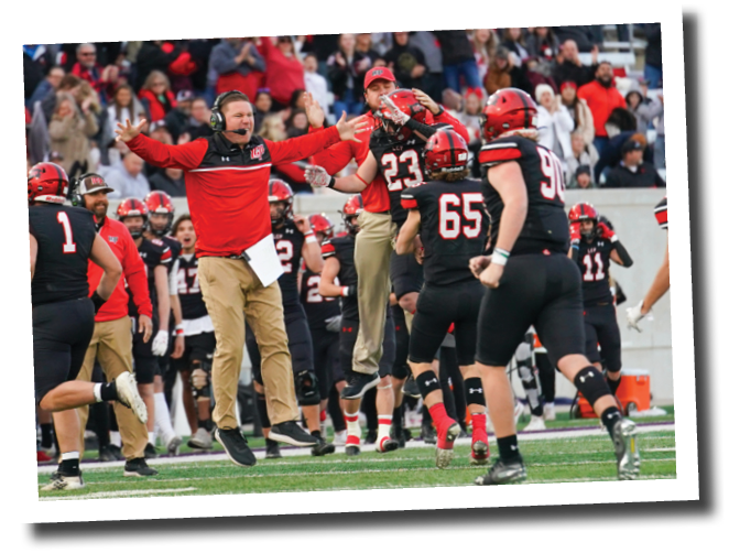 Pirate head coach Chip Darden celebrates with his players after they recover a fumble  Lubbock-Cooper vs  Grapevine  Photo by: Aaron Baxter