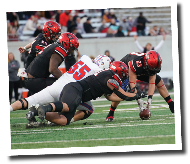 The Pirate defense forces a fumble deep in their territory  Lubbock-Cooper vs  Grapevine  Photo by: Aaron Baxter