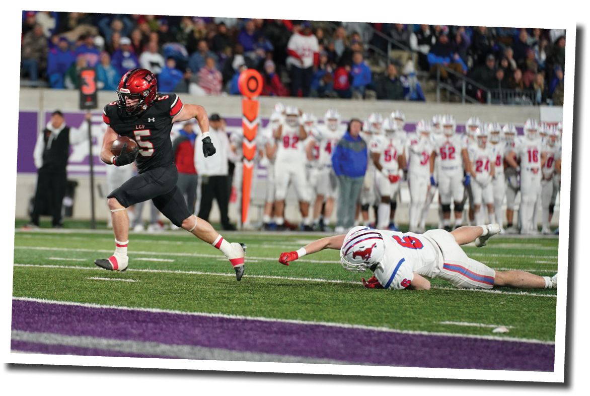 Judge Thomason makes the last man miss on his way to the endzone  Lubbock-Cooper vs  Grapevine  Photo by: Aaron Baxter