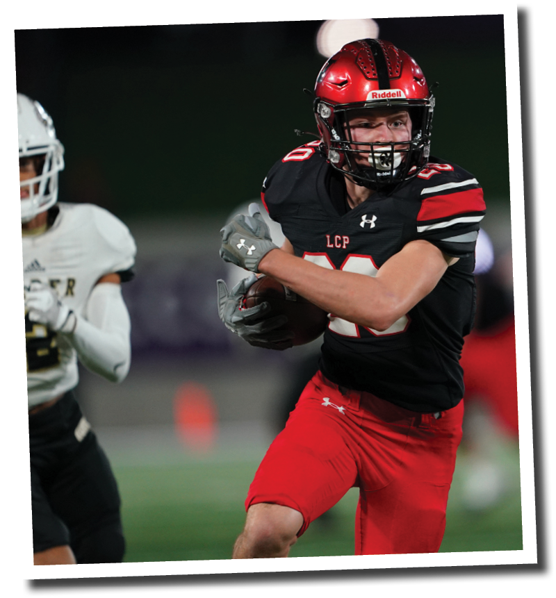 Cooper Morris snags a deep pass and turns upfield  Lubbock-Cooper vs  Rider  Photo by: Aaron Baxter
