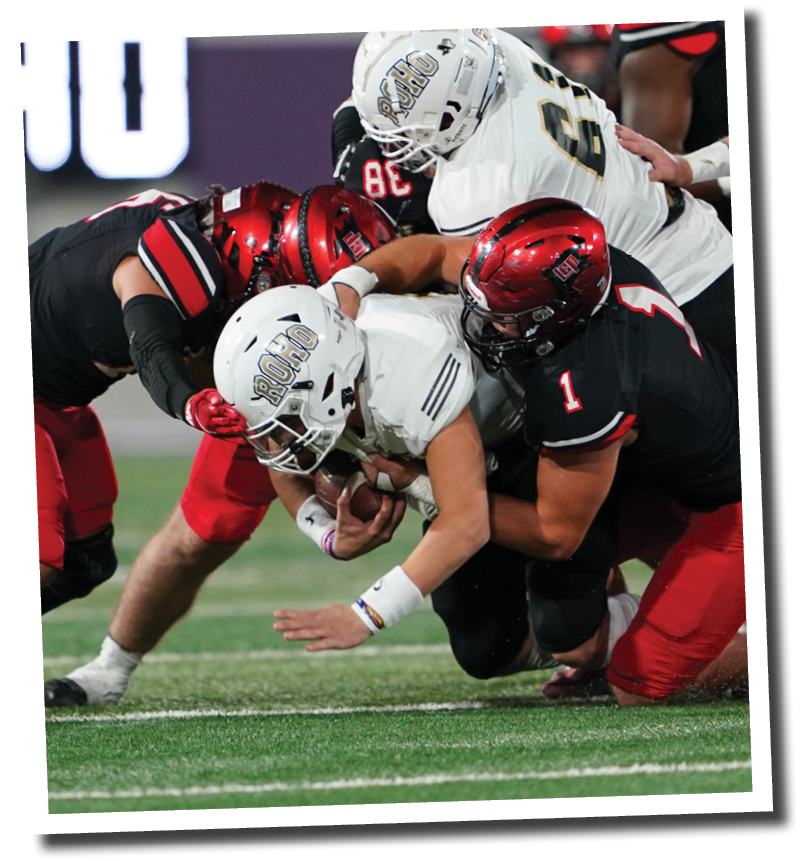Kyler Jordan (1) tackles Rider QB Jack Pitts  Lubbock-Cooper vs  Rider  Photo by: Aaron Baxter