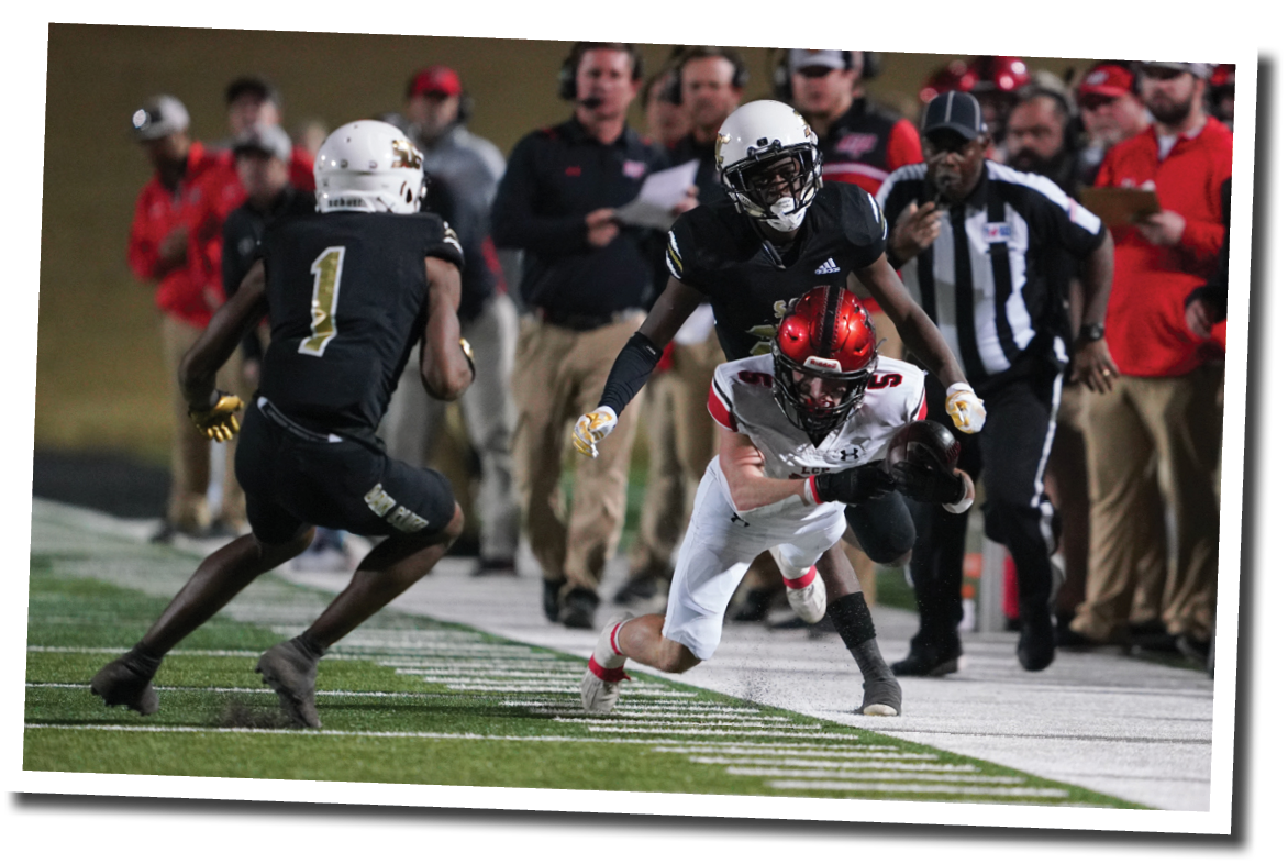 Judge Thomason (5) dives for the first down marker  5A Division 2 State Semi-Final, Lubbock-Cooper vs  South Oak Cliff  Photo by: Aaron Baxter