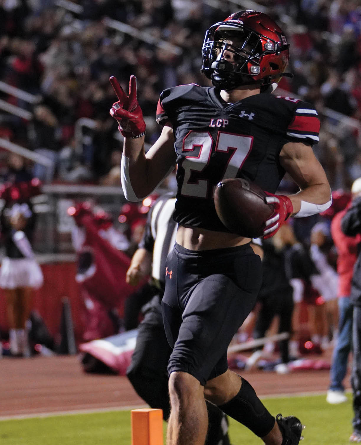 Callan Ritz (27) trots into the endzone on a long punt return  Lubbock-Cooper vs  Randall  Photo by: Aaron Baxter