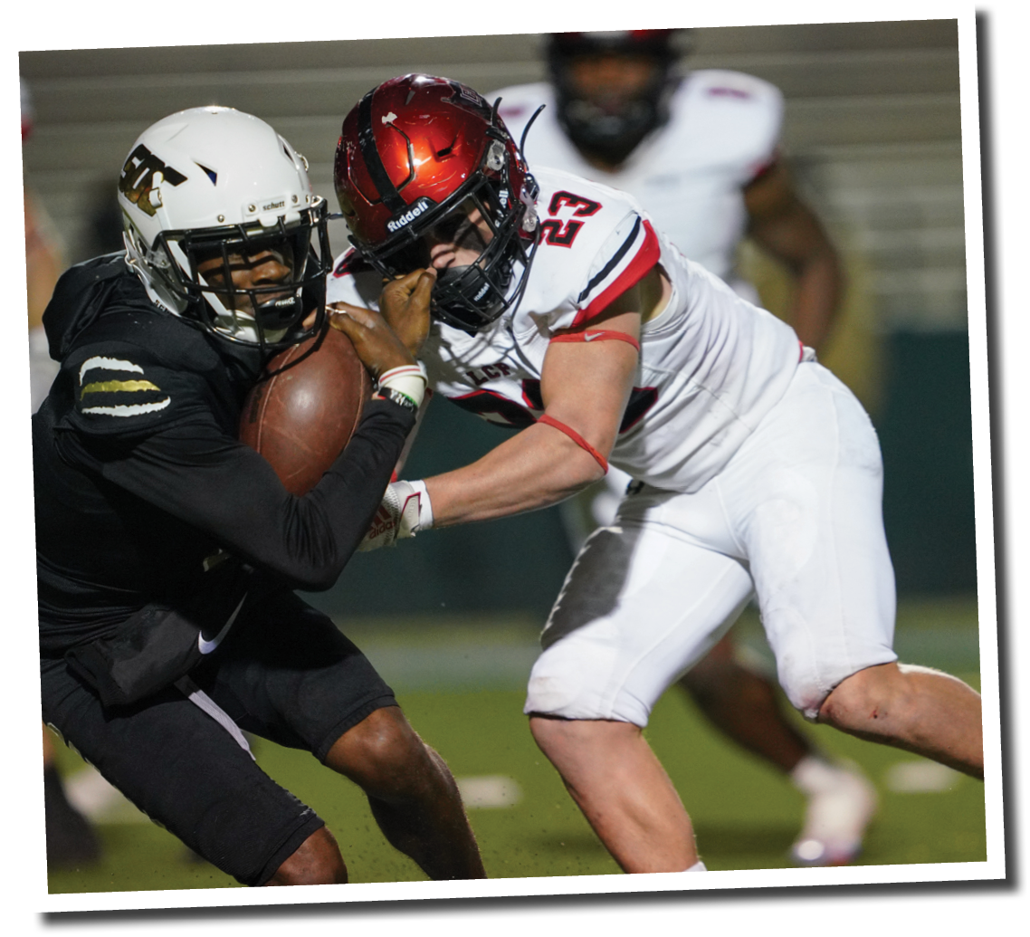 Kyle Lewis tackles South Oak Cliff QB Kevin Henry-Jennings  5A Division 2 State Semi-Final, Lubbock-Cooper vs  South Oak Cliff  Photo by: Aaron Baxter