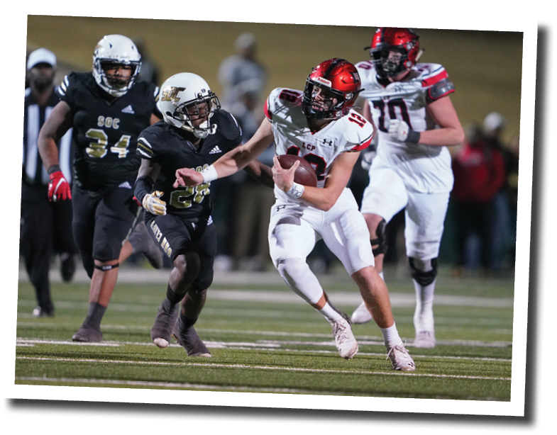 Holt Gibson runs for a first down  5A Division 2 State Semi-Final, Lubbock-Cooper vs  South Oak Cliff  Photo by: Aaron Baxter