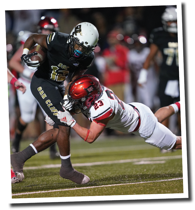 Kyle Lewis tackles Ke undrae Hollywood  5A Division 2 State Semi-Final, Lubbock-Cooper vs  South Oak Cliff  Photo by: Aaron Baxter