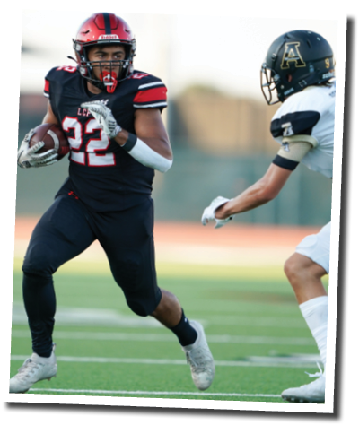 Kaleb Stripling (22) runs toward the sideline to avoid Mustang CB Gehrig Morris (9)  Lubbock-Cooper vs  Andrews  Photo by: Aaron Baxter