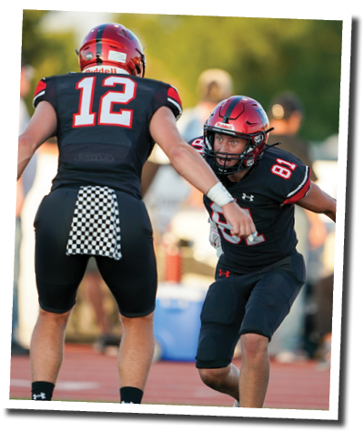 Braydon Laws (81) celebrates with his quarterback Holt Gibson (12) after a pass for a touchdown  Lubbock-Cooper vs  Andrews  Photo by: Aaron Baxter