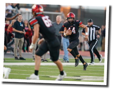 Koen Piepkorn (14) returns an interception  Lubbock-Cooper vs  Andrews  Photo by: Aaron Baxter