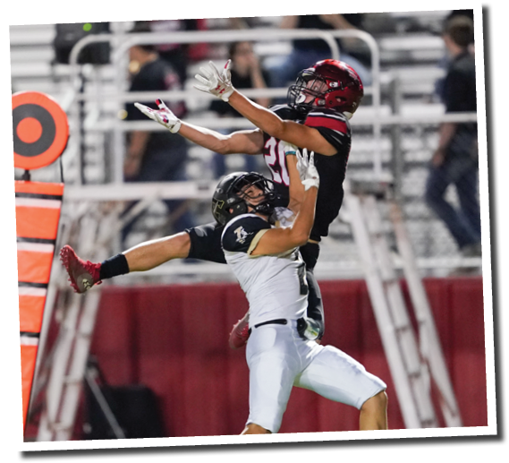Cooper Morris (20) leaps and pulls in a deep pass from QB Holt Gibson  Lubbock-Cooper vs  Andrews  Photo by: Aaron Baxter