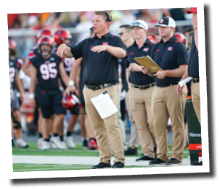 Pirate head coach Chip Darden calls a play from the sideline  Lubbock-Cooper vs  Andrews  Photo by: Aaron Baxter