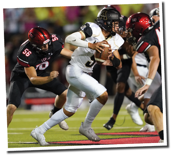 Haydon Wade (56) sacks Andrews QB EJ Lopez (5)  Lubbock-Cooper vs  Andrews  Photo by: Aaron Baxter