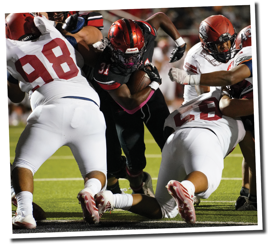 Kaden Chambers (31) jumps into the endzone  Lubbock-Cooper vs  Plainview  Photo by: Aaron Baxter