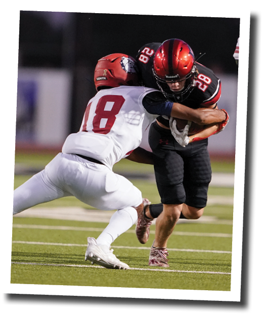 Moby Mendez (28) takes screen pass toward the home sideline  Lubbock-Cooper vs  Plainview  Photo by: Aaron Baxter