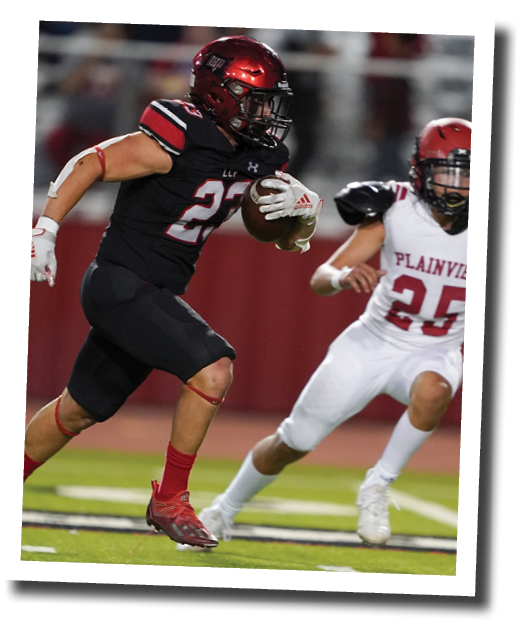 Kyle Lewis (23) runs a fake punt down inside the 5 yard line  Lubbock-Cooper vs  Plainview  Photo by: Aaron Baxter