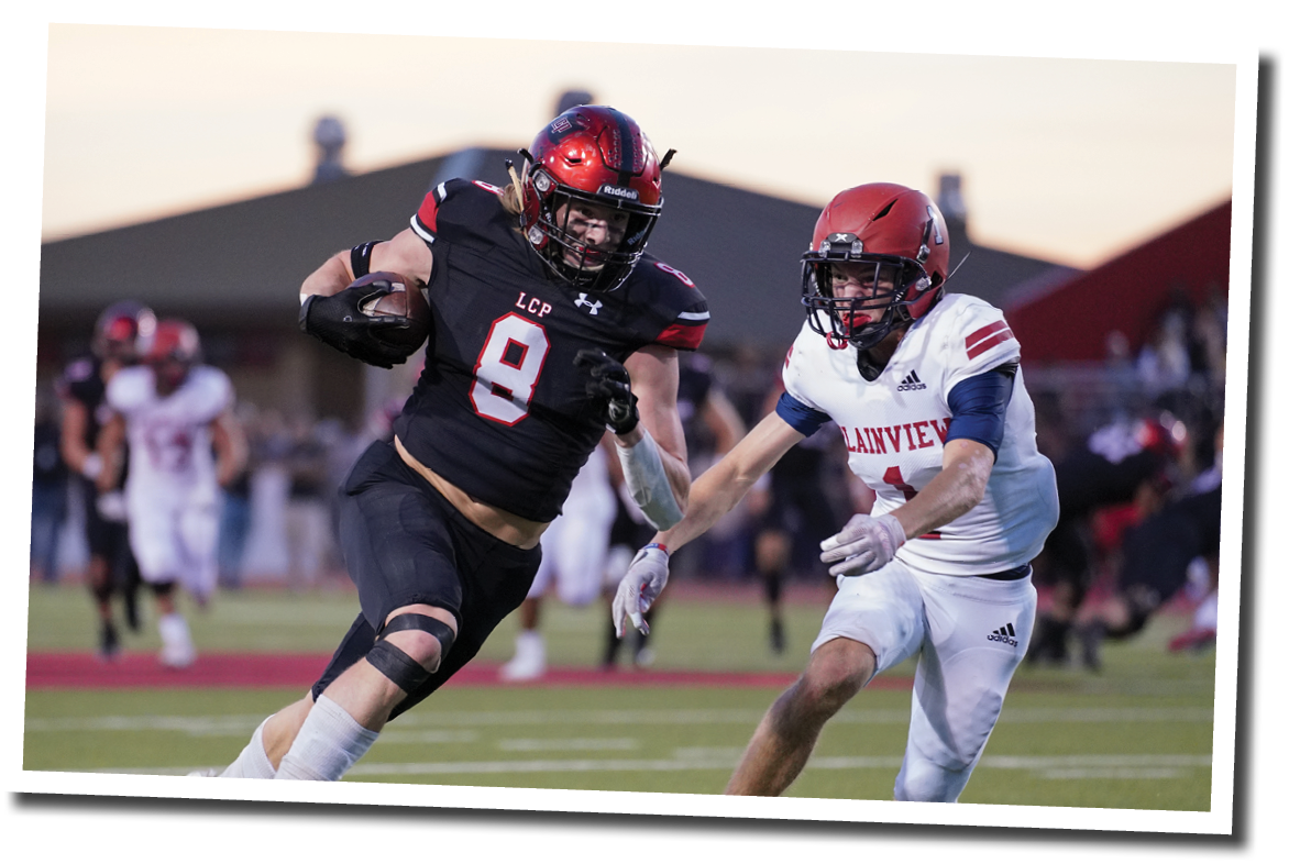  Brady Barnett (8) tries to shake a defender after catching a pass  Lubbock-Cooper vs  Plainview  Photo by: Aaron Baxter