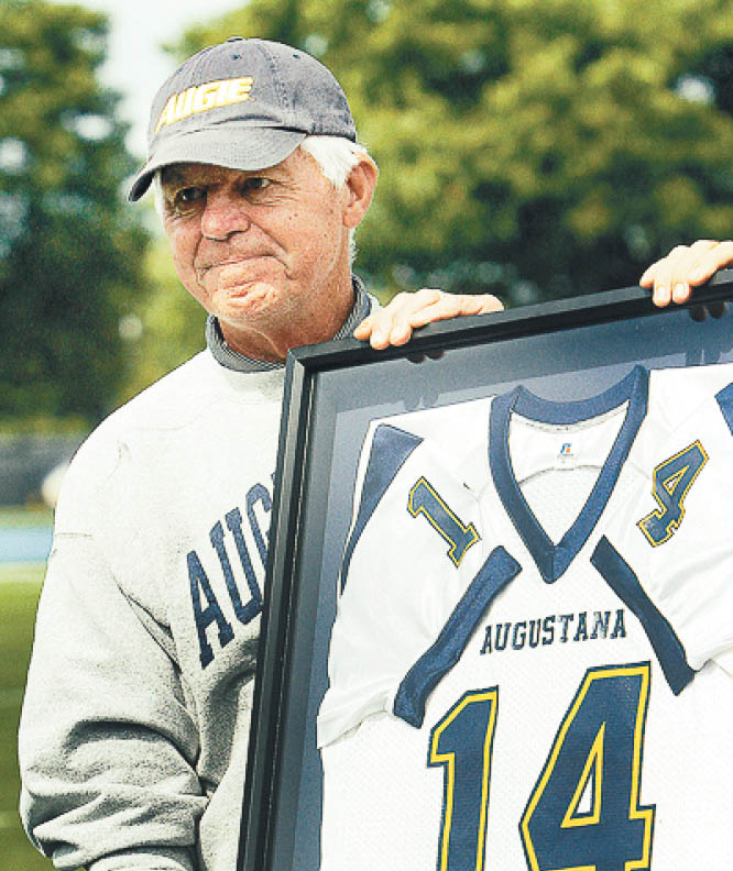 NFL Hall of Fame quarterback Ken Anderson and former Augustana stand_out, stands with his now retired Augustana jersey, Saturday, September, 17, 2011, after a ceremony at halftime of the Adrian game at Ericson Field  (John Schultz   Quad-City Times)       Published Cutline     Former Augustana quarterback Ken Anderson is a candidate for the Pro Football Hall of Fame 