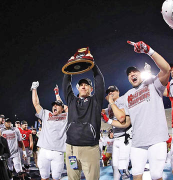 National champions: North Central College in Naperville celebrates Saturday at the school the national D-III playoff championship won Friday evening. The North Central Cardinals, who won five playoff games, defeated the University of Wisconsin-Whitewater, 41-14, in the Stagg Bowl in Shenandoah, Texas. It was North Central College’s first football national championship. North Central College photo