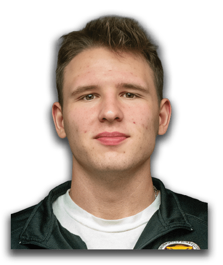 A man wearing a black jacket and white shirt is posing for a picture. AI generated content